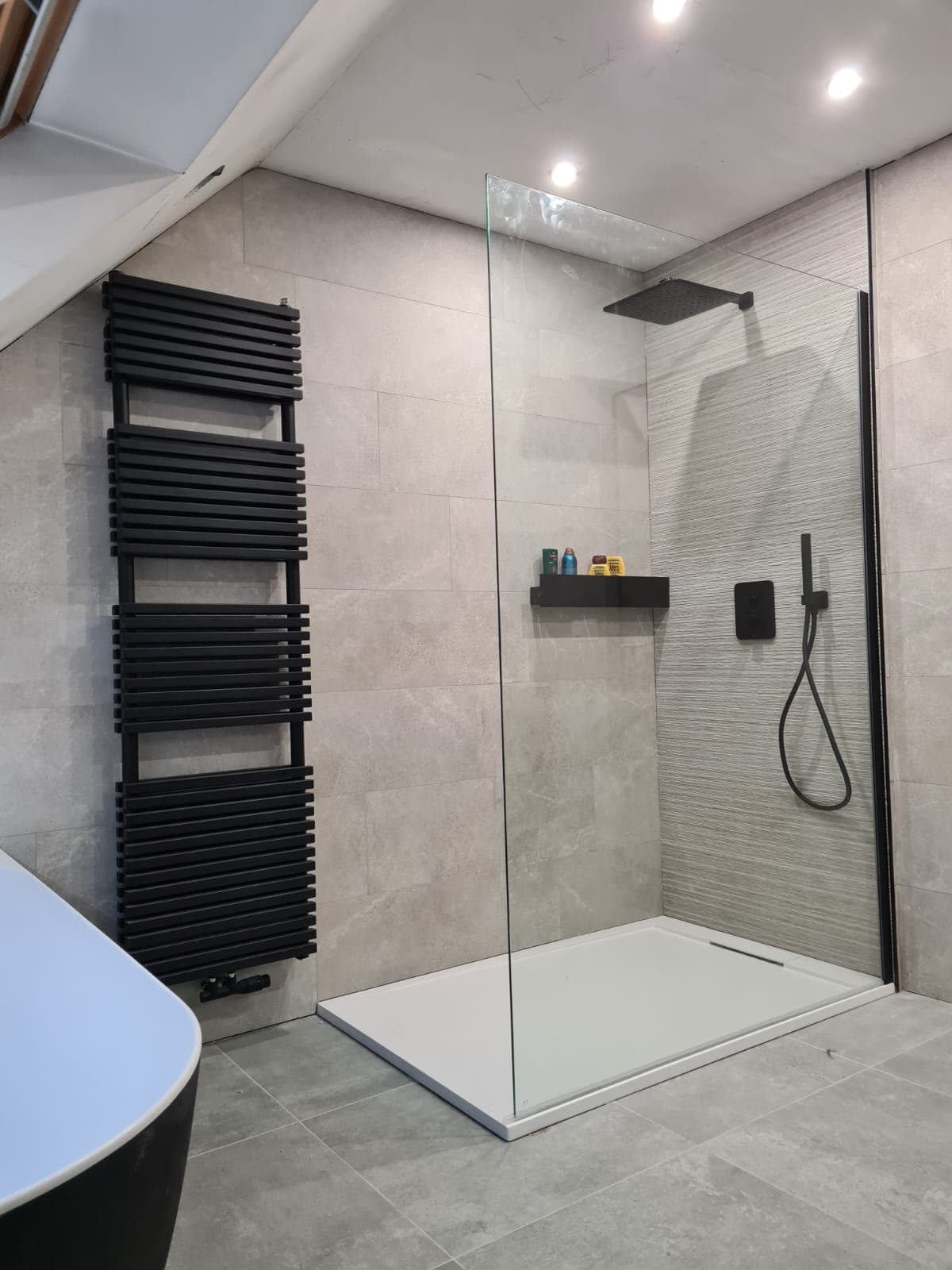 Zolderbadkamer met vrijstaand bad · Antwerpen